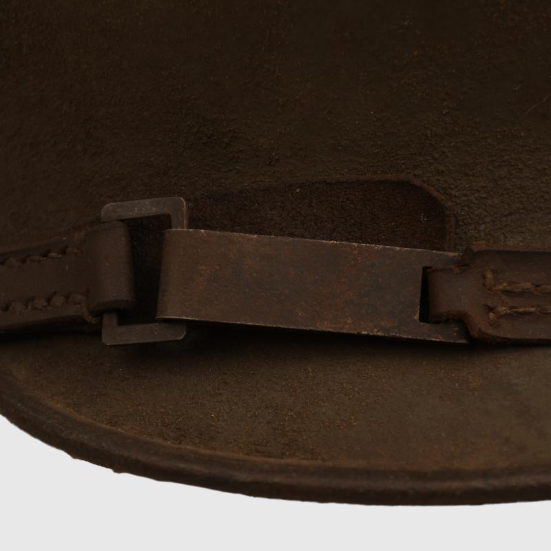 GERMAN WWI M.18 EAR CUT OUT HELMET.