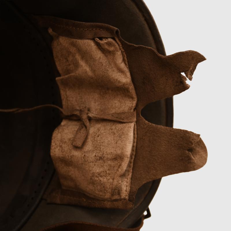 GERMAN WWI M.18 EAR CUT OUT HELMET.