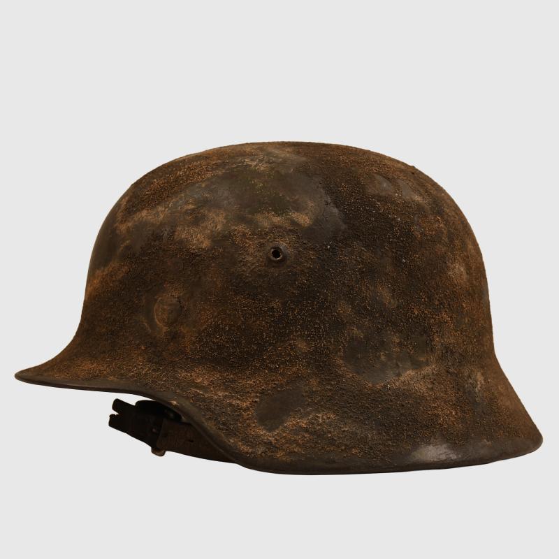 GERMAN WWII CAMOUFLAGED M.35 ARMY COMBAT HELMET.