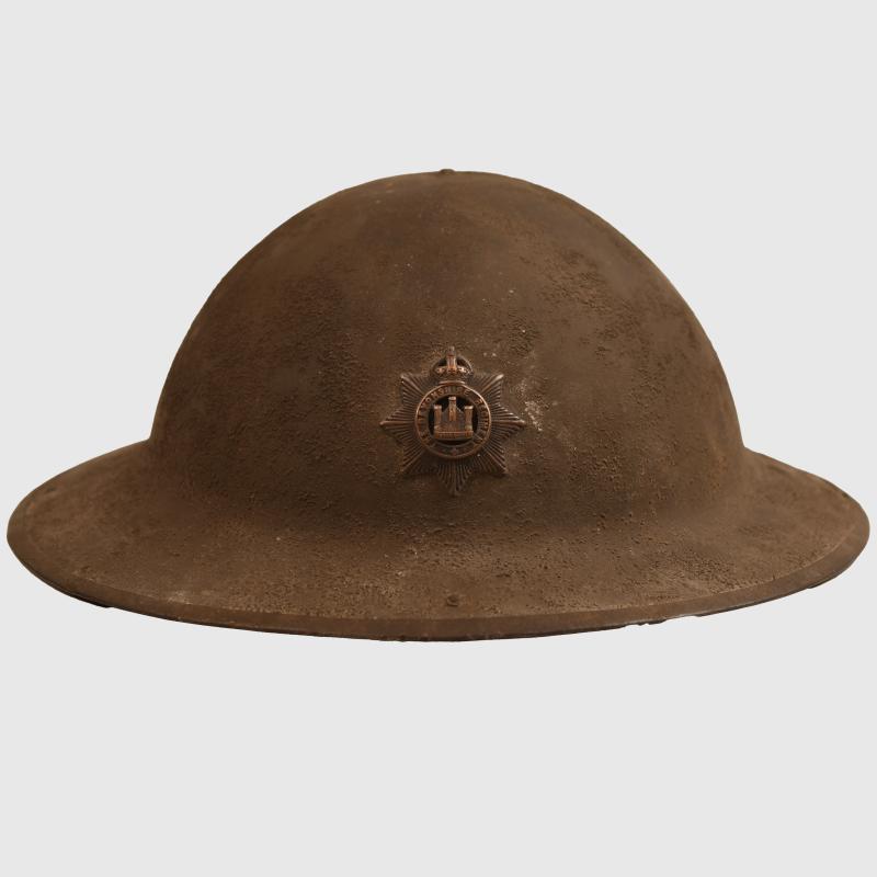 BRITISH WWI DEVONSHIRE REGIMENT BRODIE HELMET WITH OFFICERS LINER.