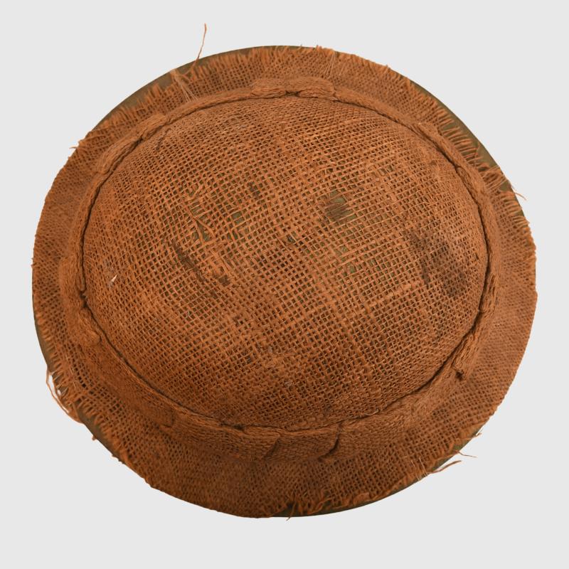 BRITISH WWI 1ST PATTERN BRODIE HELMET WITH A RARE TYPE OF SACKING COVER.