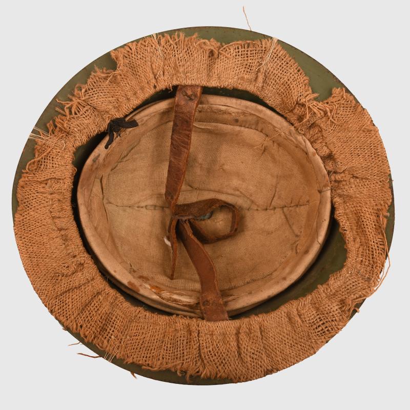 BRITISH WWI 1ST PATTERN BRODIE HELMET WITH A RARE TYPE OF SACKING COVER.