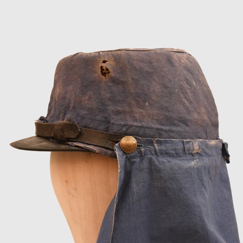 FRENCH FOREIGN LEGION KEPI WITH BLUE AND WHITE COVERS.