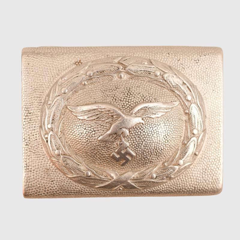 GERMAN WWII LUFTWAFFE ONE-PIECE STAMPED ALUMINIUM BUCKLE.