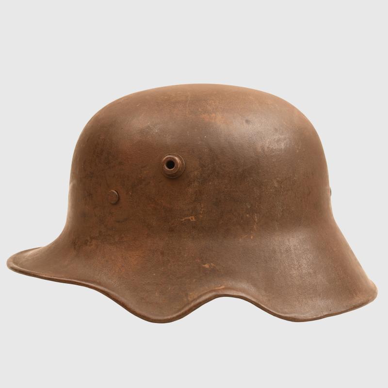 GERMAN WWI M.18 EAR CUT OUT HELMET.