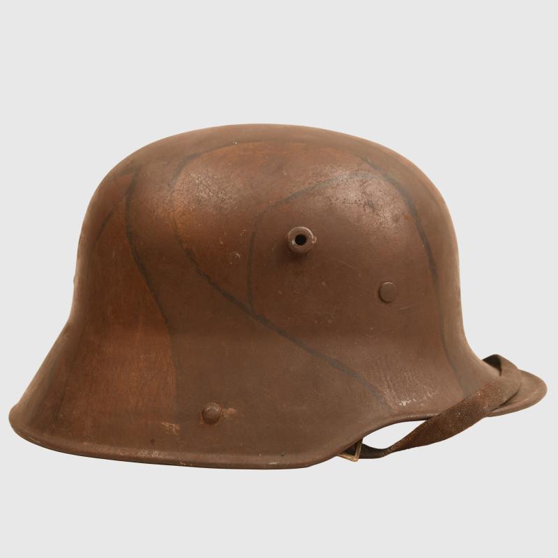 GERMAN WWI M.17 CAMOUFLAGE TRENCH HELMET WITH ORIGINAL CHINSTRAP AND LINER.