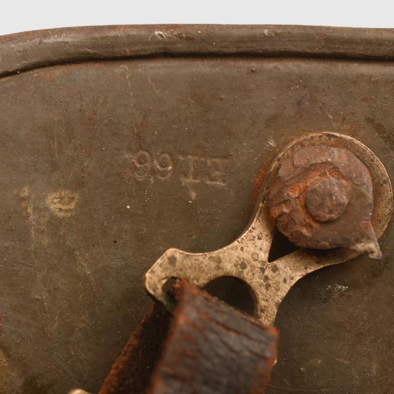 GERMAN WWI M.17 CAMOUFLAGE TRENCH HELMET WITH ORIGINAL CHINSTRAP AND LINER.