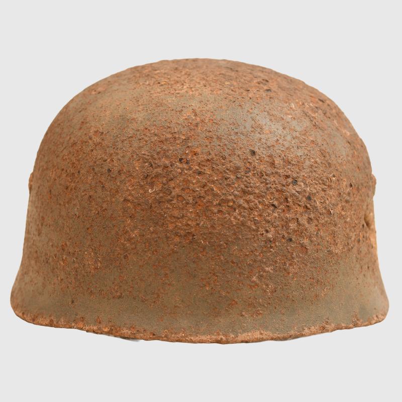GERMAN WWII GROUND DUG PARATROOPER HELMET SHELL AND PARTIAL LINER.