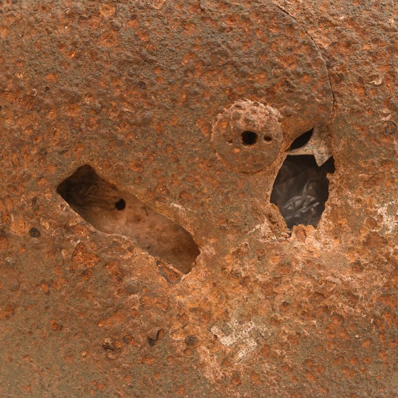 GERMAN WWII GROUND DUG PARATROOPER HELMET SHELL AND PARTIAL LINER.