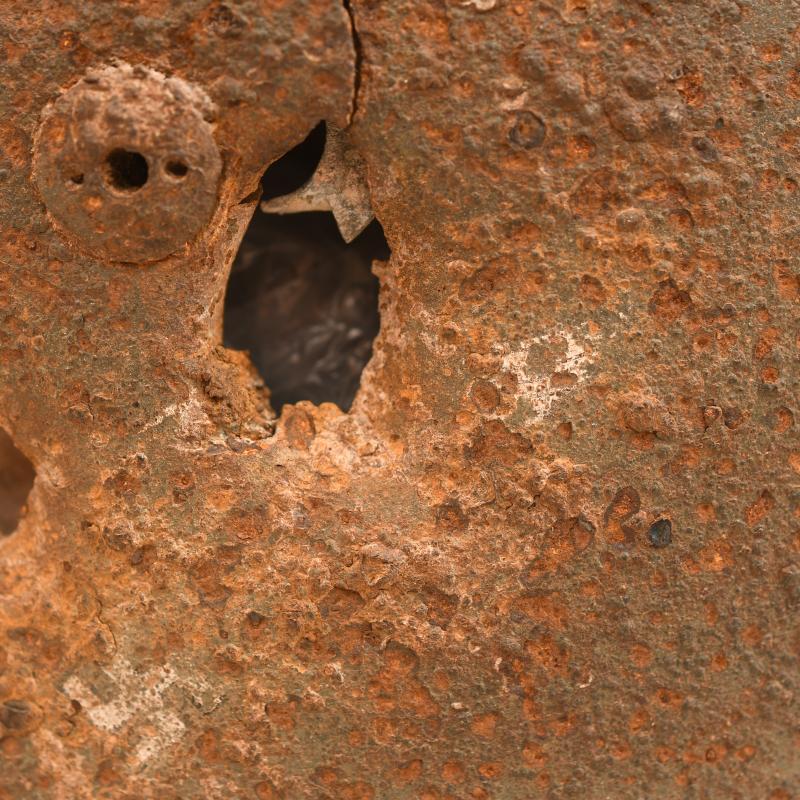 GERMAN WWII GROUND DUG PARATROOPER HELMET SHELL AND PARTIAL LINER.