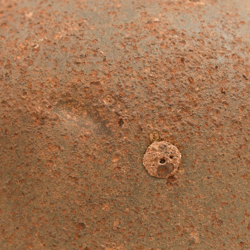 GERMAN WWII GROUND DUG PARATROOPER HELMET SHELL AND PARTIAL LINER.