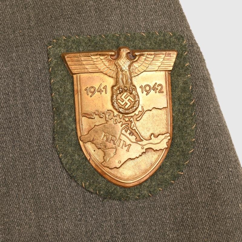 GERMAN WWII INFANTRY OBERLEUTNANT COMBAT TUNIC WITH KRIM SHIELD.