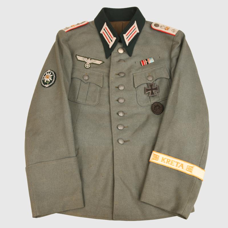 GERMAN WWII ARTILLERY OFFICERS COMBAT TUNIC WITH KRETA CUFF TITLE.