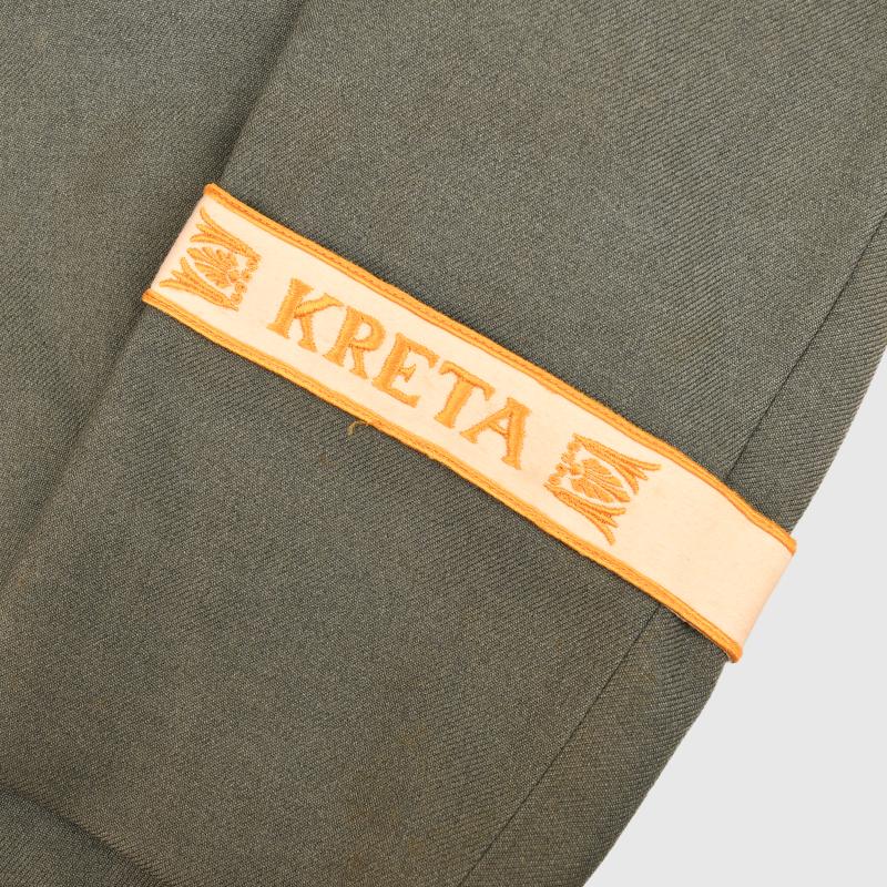 GERMAN WWII ARTILLERY OFFICERS COMBAT TUNIC WITH KRETA CUFF TITLE.