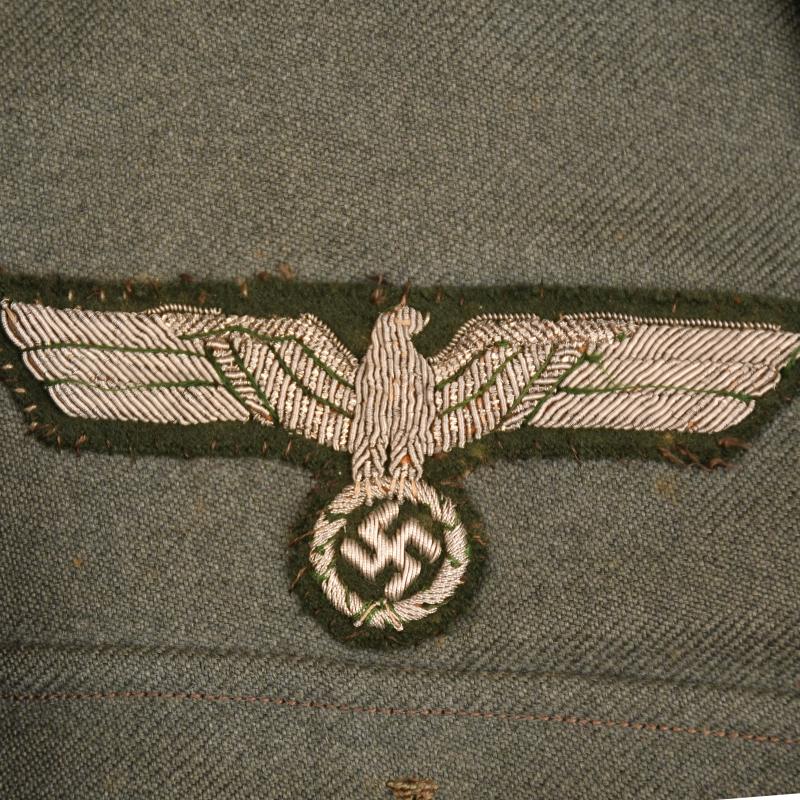GERMAN WWII ARTILLERY OFFICERS COMBAT TUNIC WITH KRETA CUFF TITLE.