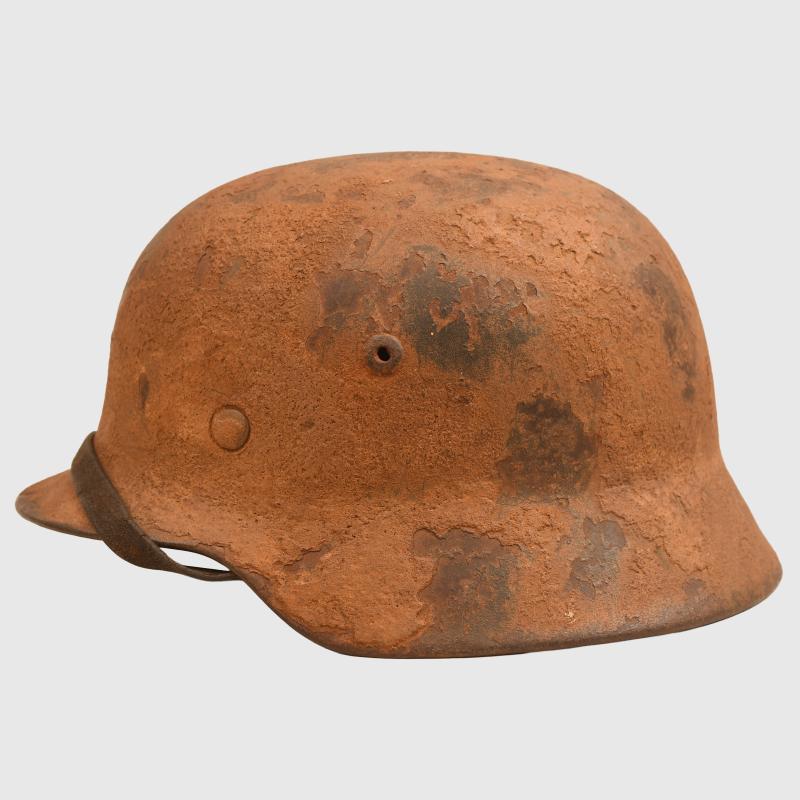 GERMAN WWII NORTH AFRICA USED TROPICAL ARMY M35 COMBAT HELMET.