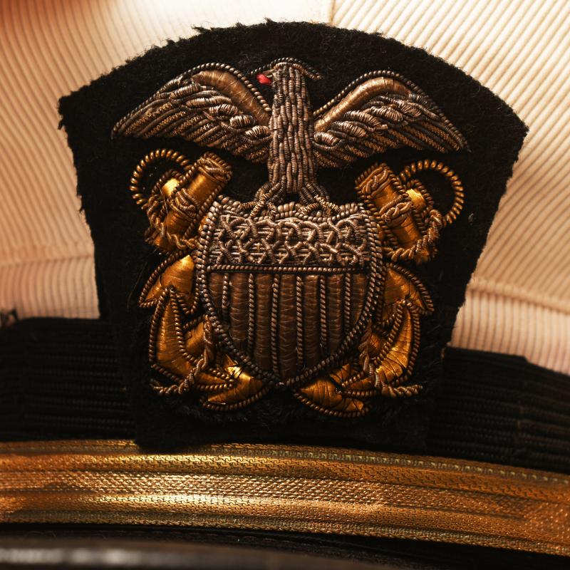 US WWII WHITE TOP NAVAL OFFICERS VISOR CAP.