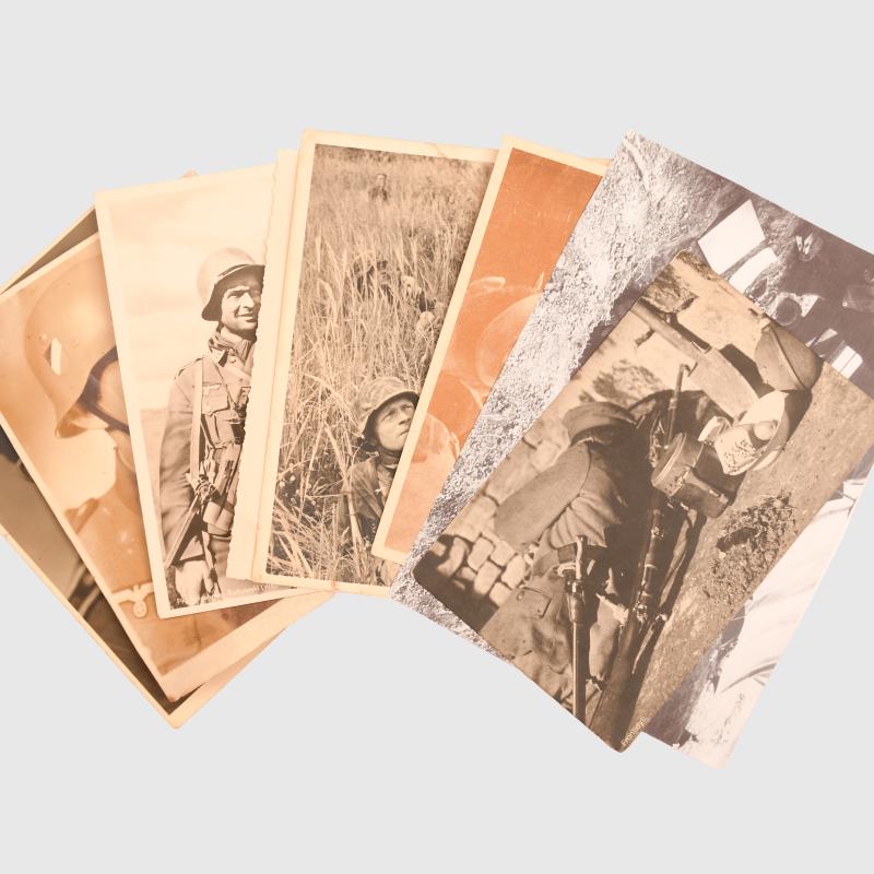 GERMAN WWII 30 PHOTOGRAPHS OF GERMAN ARMY, WAFFEN SS AND LUFTWAFFE TROOPS IN MAINLY COMBAT SITUATIONS.