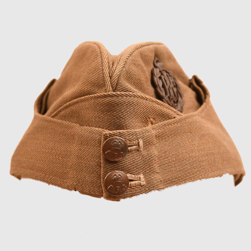 BRITISH WWI ROYAL FLYING CORPS OFFICERS OVERSEAS CAP AND FLYING HELMET.
