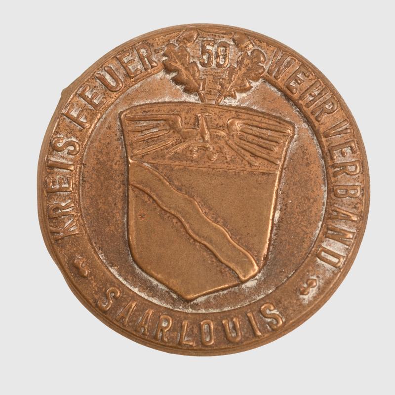 GERMAN WWII SAAR LOUIS CIRCULAR BRASS TINNY.