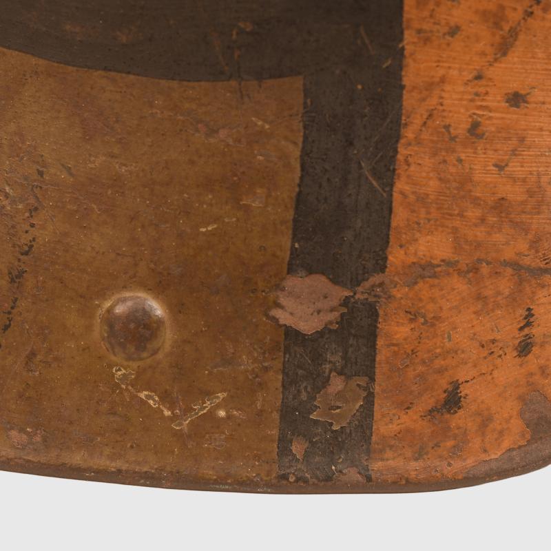 GERMAN WWI M.16 CAMOUFLAGE TRENCH HELMET WITH PARTIAL CHINSTRAP.