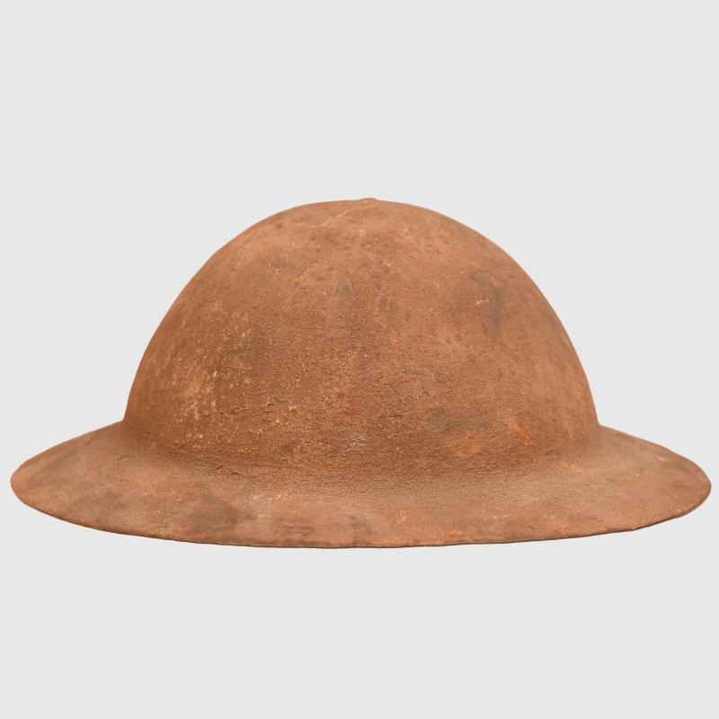 BRITISH WWI BRODIE 1ST PATTERN COMBAT HELMET.