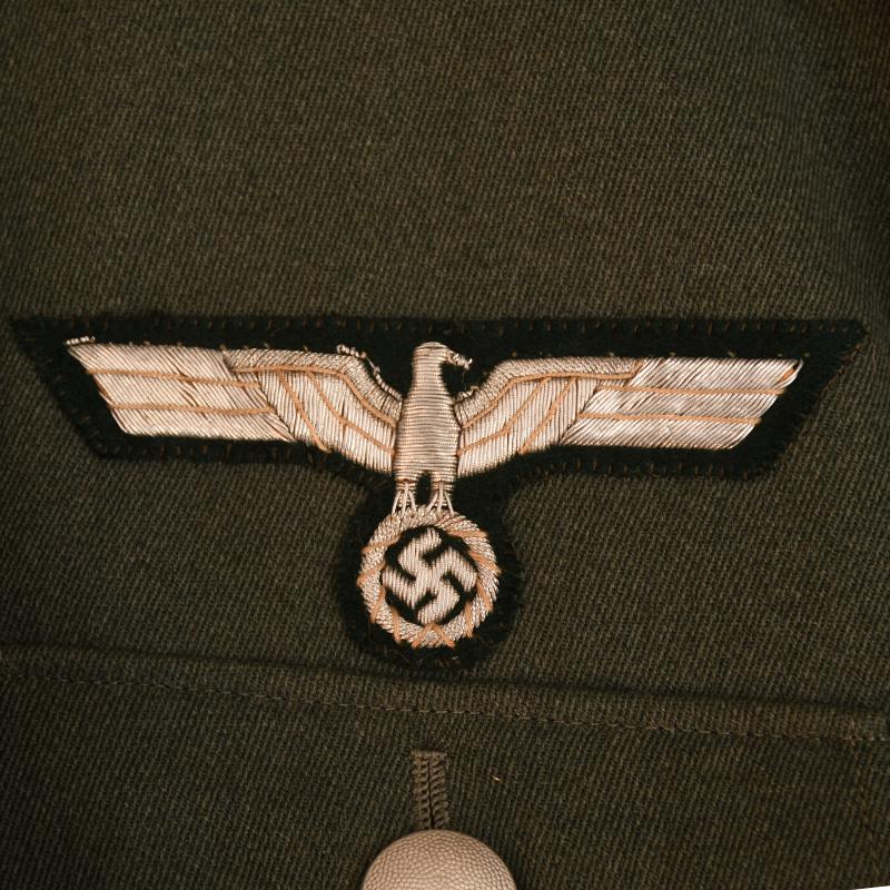 GERMAN WWII ARMY VETERINANY PIPED SERVICE TUNIC AND BREECHES.