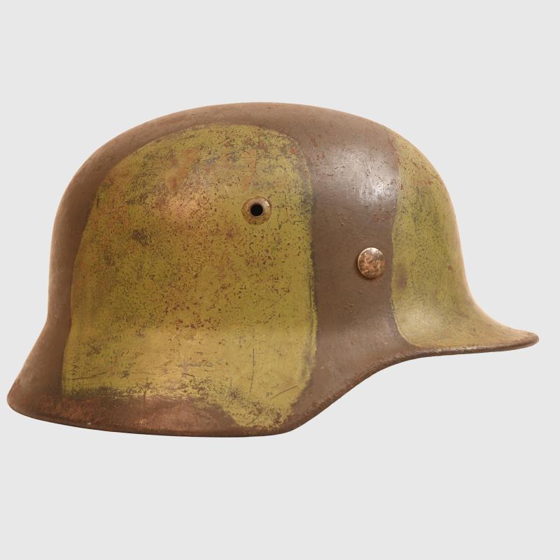 GERMAN WWII ARMY M35 CAMOUFLAGE HELMET.