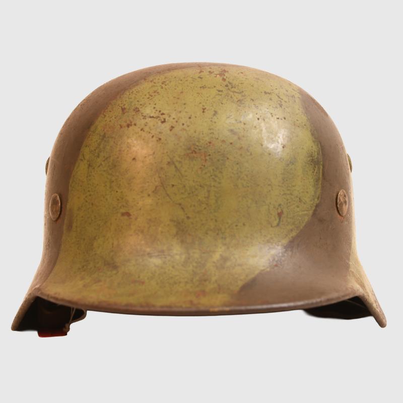 GERMAN WWII ARMY M35 CAMOUFLAGE HELMET.