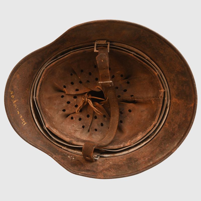 GERMAN WWII ARMY M35 CAMOUFLAGE HELMET.