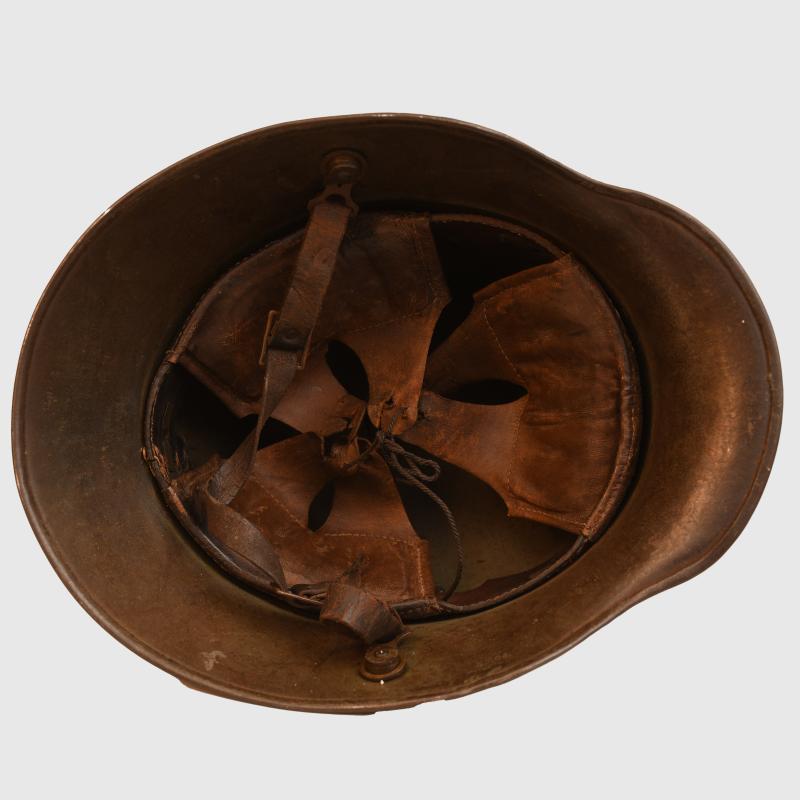 GERMAN WWI M.16 TRENCH HELMET WITH LINER AND ORIGINAL CHINSTRAP.