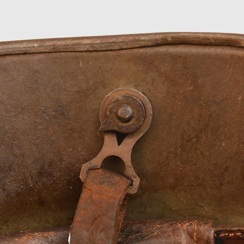 GERMAN WWI M.16 TRENCH HELMET WITH LINER AND ORIGINAL CHINSTRAP.