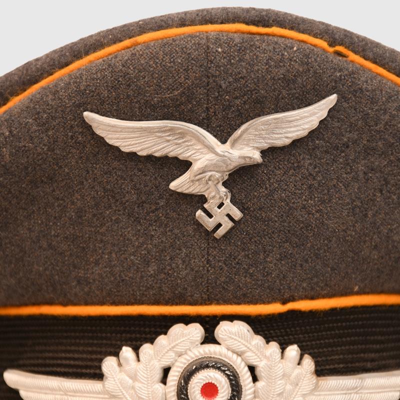 GERMAN WWII LUFTWAFFE NCO OR MAN’S VISOR CAP OF THE RESERVE.