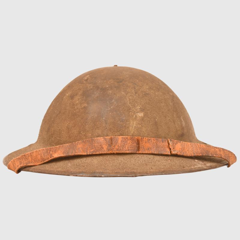 BRITISH WWI BRODIE COMBAT HELMET.