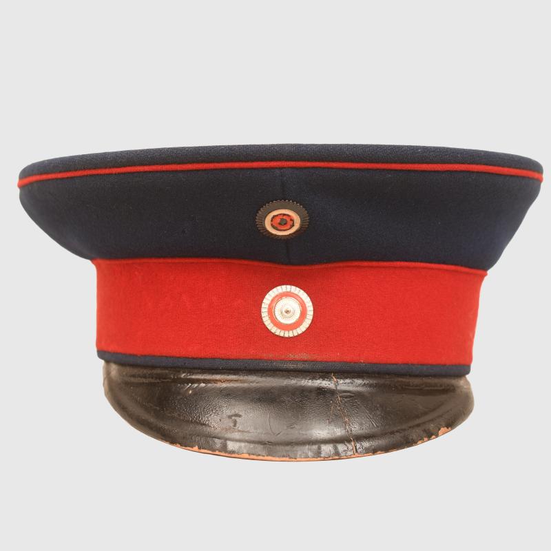 GERMAN WWI HESSIAN OFFICERS VISOR CAP WITH FIELD COVER.