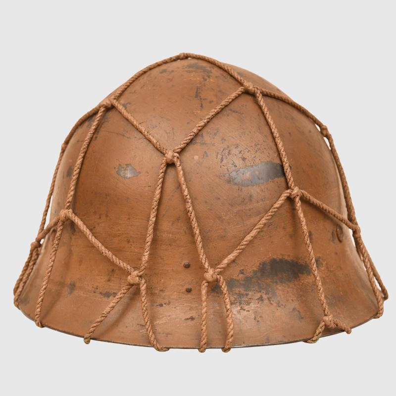 JAPANESE WWII TYPE 90 ARMY COMBAT HELMET WITH STRING NET.