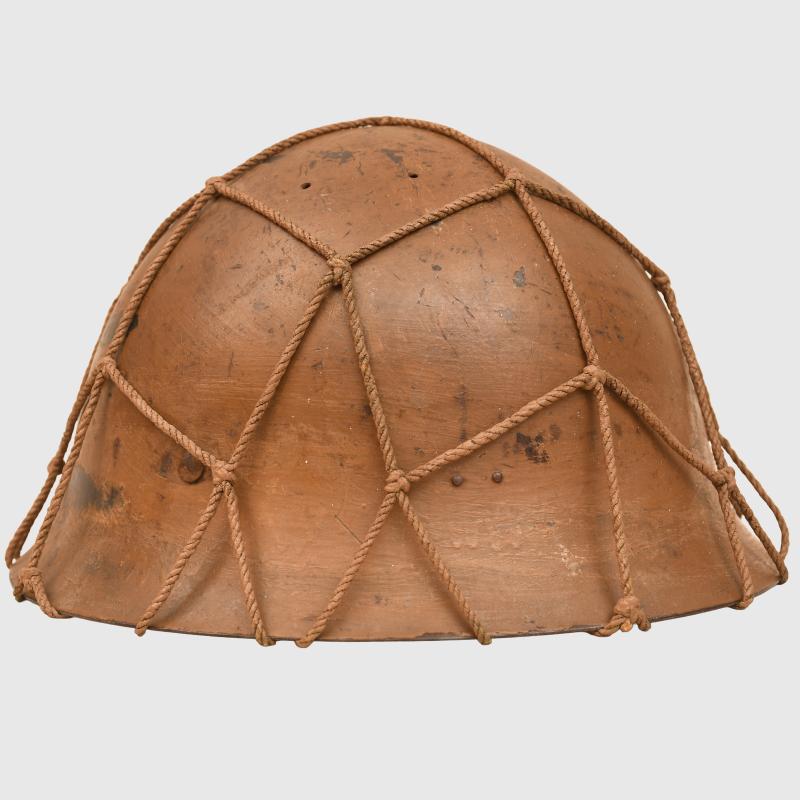 JAPANESE WWII TYPE 90 ARMY COMBAT HELMET WITH STRING NET.